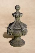 A stone composition pier finial modelled as an urn in Renaissance style