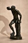 A French patinated bronze model of the Faun with Clappers