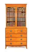 ϒ A George III satinwood and rosewood banded secretaire bookcase