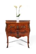 A French kingwood, tulipwood and bois satine serpentine secretaire commode, in Louis XV style