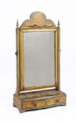 A green lacquer and gilt Chinoiserie decorated dressing mirror