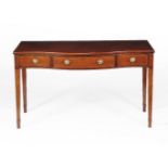 A George III mahogany serpentine fronted serving table