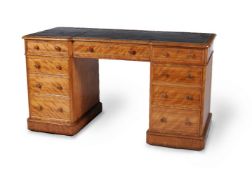 A Victorian satinbirch pedestal desk