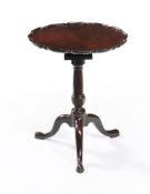 A George III mahogany 'pie-crust' tripod table