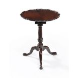 A George III mahogany 'pie-crust' tripod table