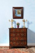 A George II walnut chest of drawers