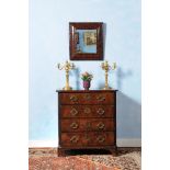 A George II walnut chest of drawers