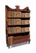 A Regency mahogany 'waterfall' bookcase