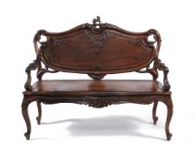 ϒ A pair of carved padouk or rosewood seats