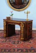 A George III mahogany, giltwood and brass mounted desk