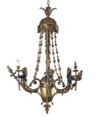 A Continental parcel gilt and painted six light figural electrolier in Charles X style