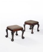 A companion pair of George II Irish mahogany stools