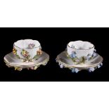 A Meissen flower-encrusted cabinet cup and saucer