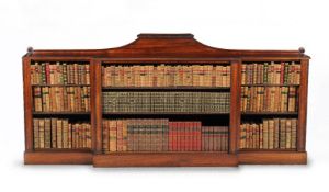 ϒ A Regency rosewood breakfront open bookcase