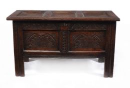 A Charles II panelled oak chest