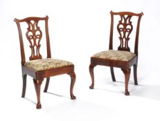 A set of six George II mahogany dining chairs