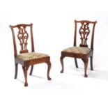 A set of six George II mahogany dining chairs