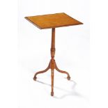 ϒ A George III satinwood and kingwood banded tripod table