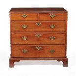 A George II walnut chest of drawers