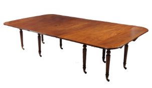 A Regency mahogany extending dining table