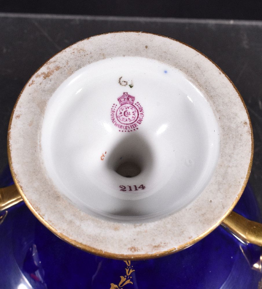A pair of Royal Worcester blue-ground and gilt two-handled cabinet cups signed and painted by George - Image 3 of 3