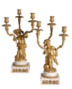 A pair of white marble mounted gilt bronze three light figural candelabra in Louis XV taste