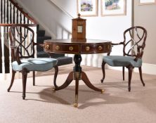 A Regency rosewood and gilt metal mounted drum library table