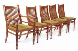 A set of six Victorian Arts and Crafts walnut dining chairs