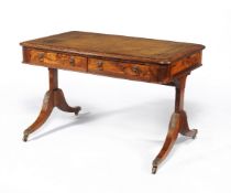 ϒ A Regency rosewood and gilt metal mounted library table