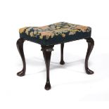 A George III mahogany stool