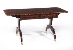 A Regency mahogany and coramandle banded sofa table