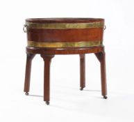 A George III mahogany and brass bound wine cooler