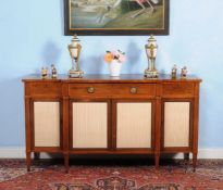 ϒ A Regency rosewood and satinwood banded breakfront side cabinet