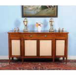 ϒ A Regency rosewood and satinwood banded breakfront side cabinet