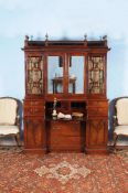 A George III mahogany breakfront secretaire bookcase