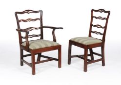 A matched set of twenty mahogany dining chairs
