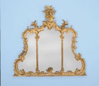 A carved giltwood overmantel mirror in George III style