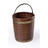 A George III mahogany and brass mounted peat bucket