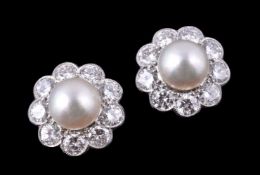 A pair of pearl and diamond earrings