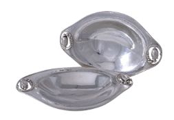 Georg Jensen, a pair of Danish silver Blossom pattern long oval dishes