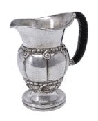 ϒ Georg Jensen, a Danish silver water jug or pitcher