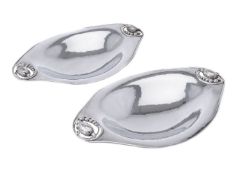 Georg Jensen, a pair of Danish silver Blossom pattern long oval dishes
