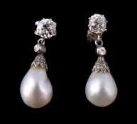 A pair of early 20th century natural pearl and diamond ear pendants