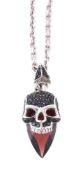 A black diamond and garnet skull pendant by Stephen Webster