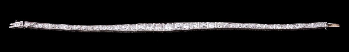 An early 20th century diamond graduated line bracelet