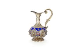 An Italian silver coloured gilt, enamel and gem set ewer