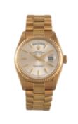 Rolex, Oyster Perpetual, Day-Date, ref. 1803/8 an 18 carat gold bracelet watch