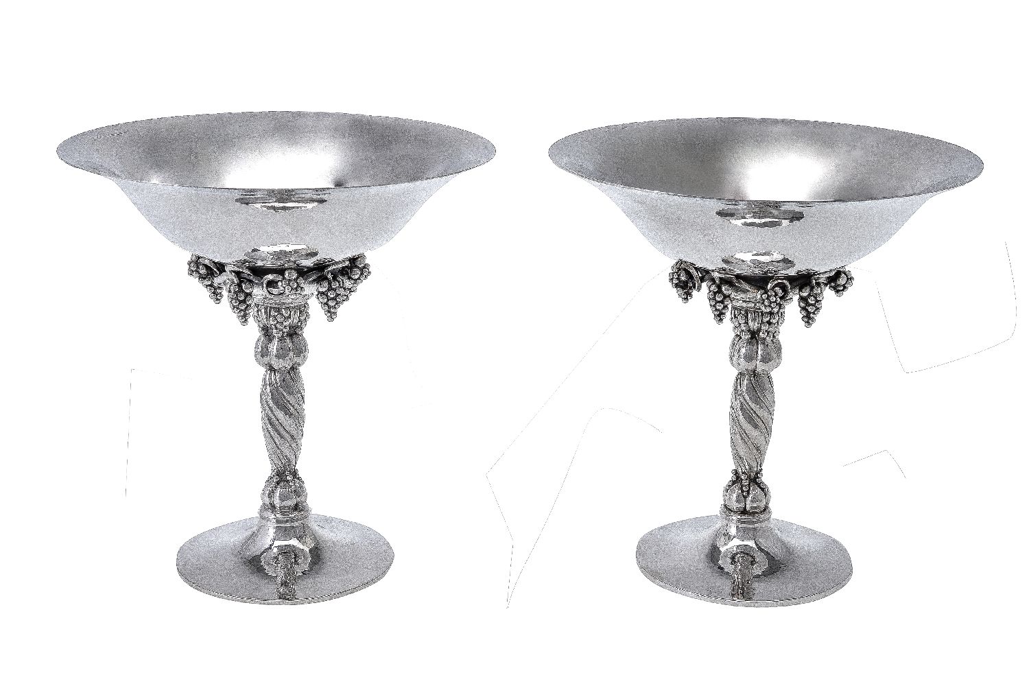 Georg Jensen, a pair of Danish silver Grape pattern pedestal bowls