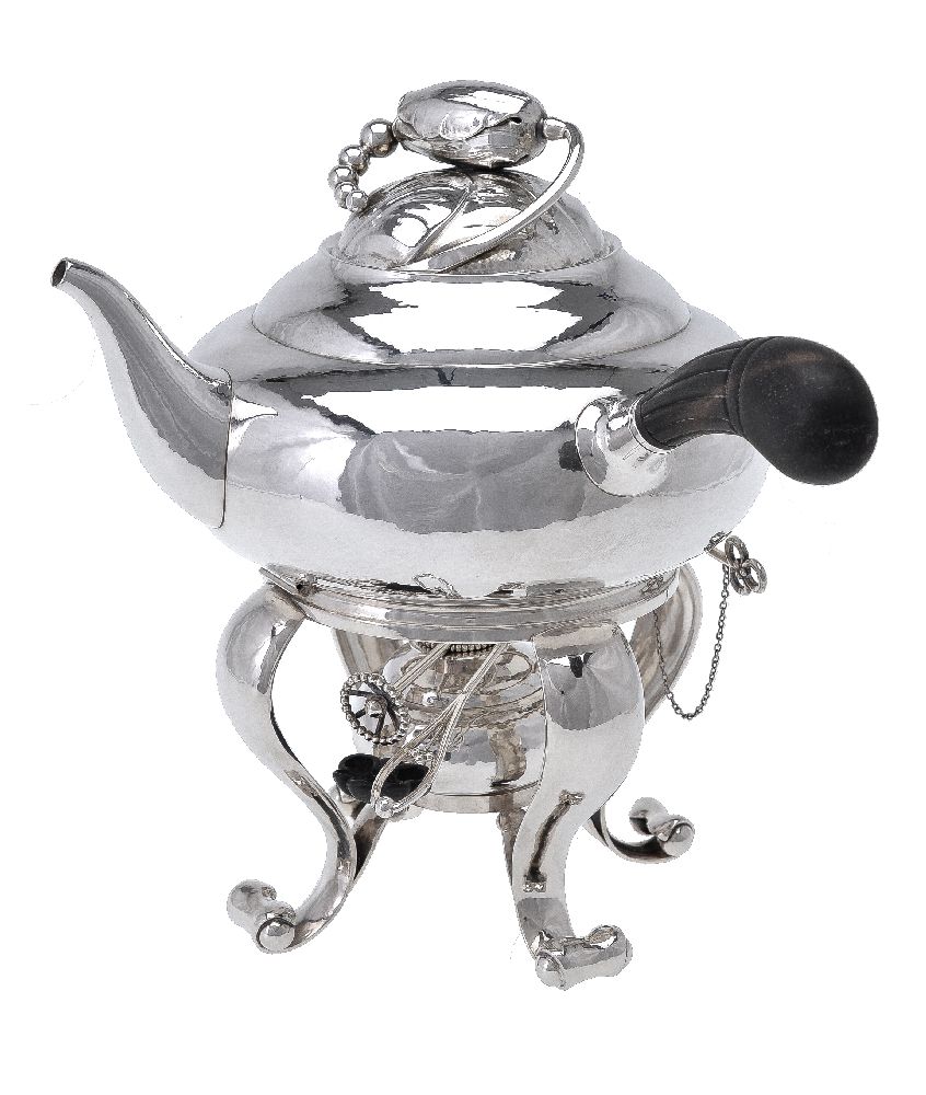 ϒ Georg Jensen, a Danish silver Blossom pattern kettle on stand