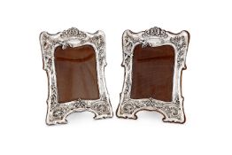 A matched pair of Art Nouveau silver photograph frames